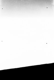 A minimalist black and white image representing transformation.