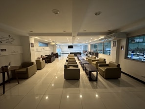 A welcoming lounge area with comfortable seating and a coffee table.