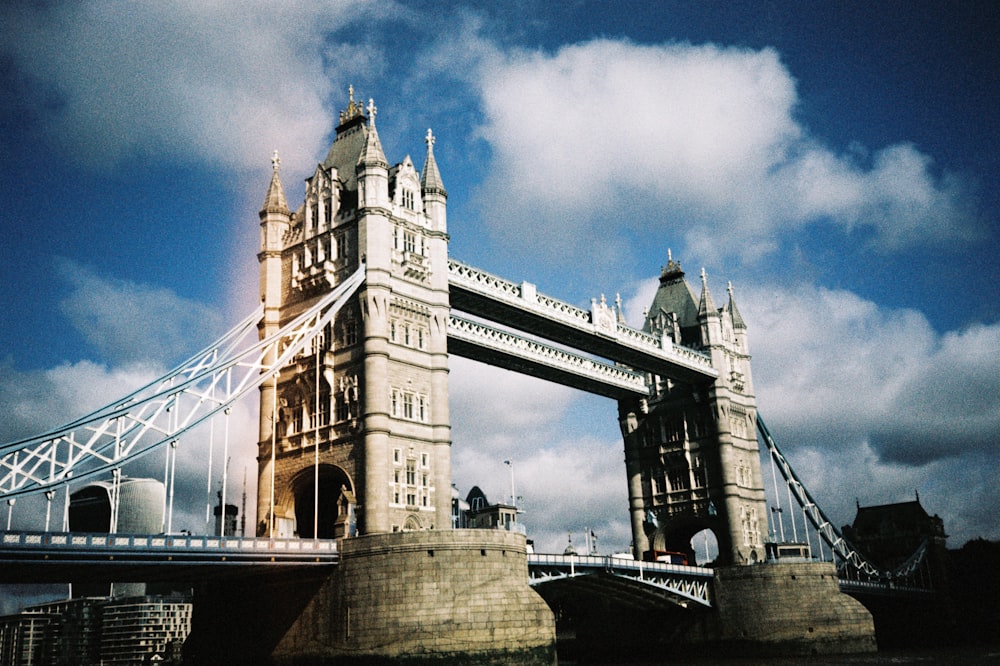 a tall bridge with a sky background