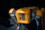 a close up of a robot that is yellow