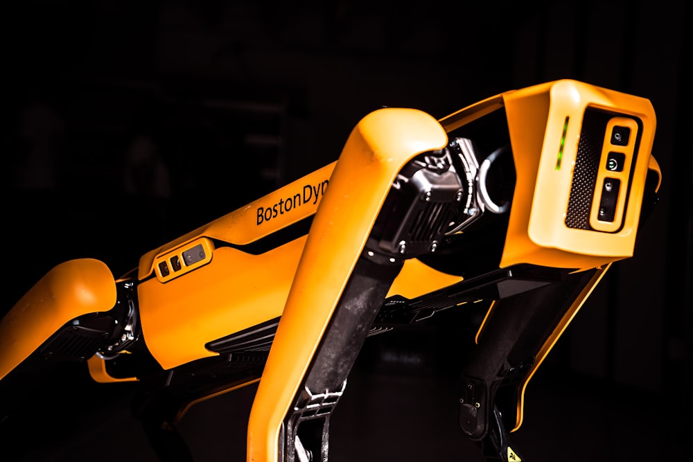 a close up of a yellow and black bike