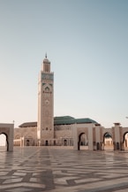 a large building with a clock tower in the middle of it