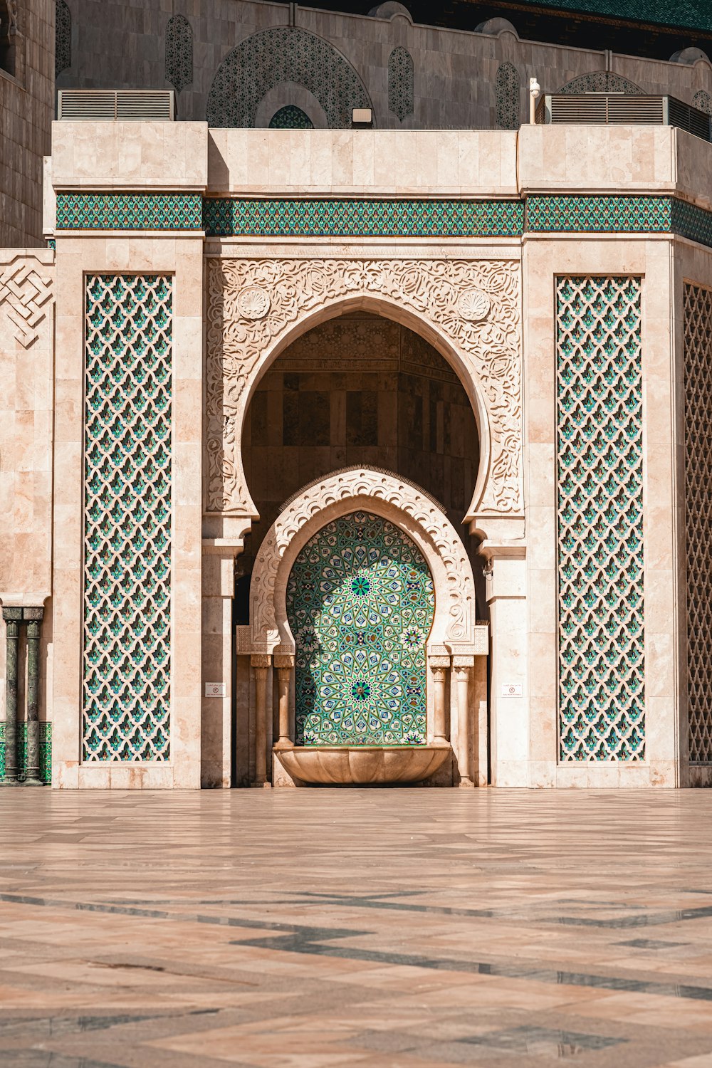 a building with a green and white door