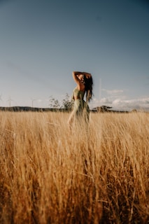 A peaceful moment showing a patient stretching with improved posture after treatment.