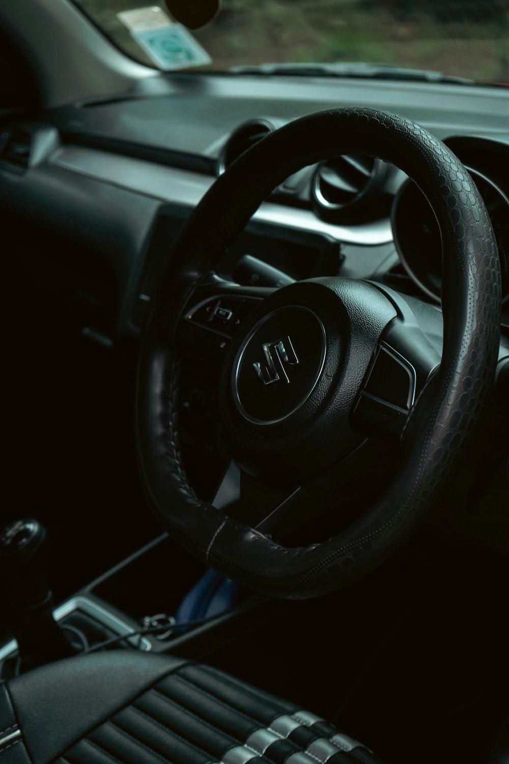 a steering wheel and dashboard of a car