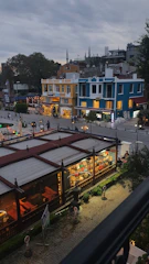 A street view showcasing vibrant community spaces in a residential area.