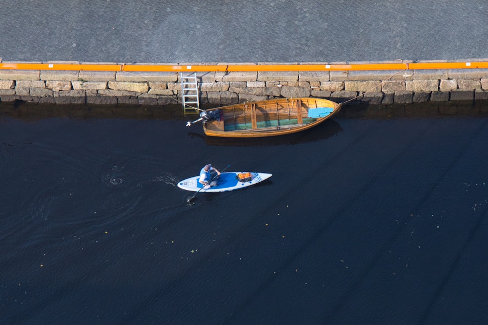 two small boats in a body of water