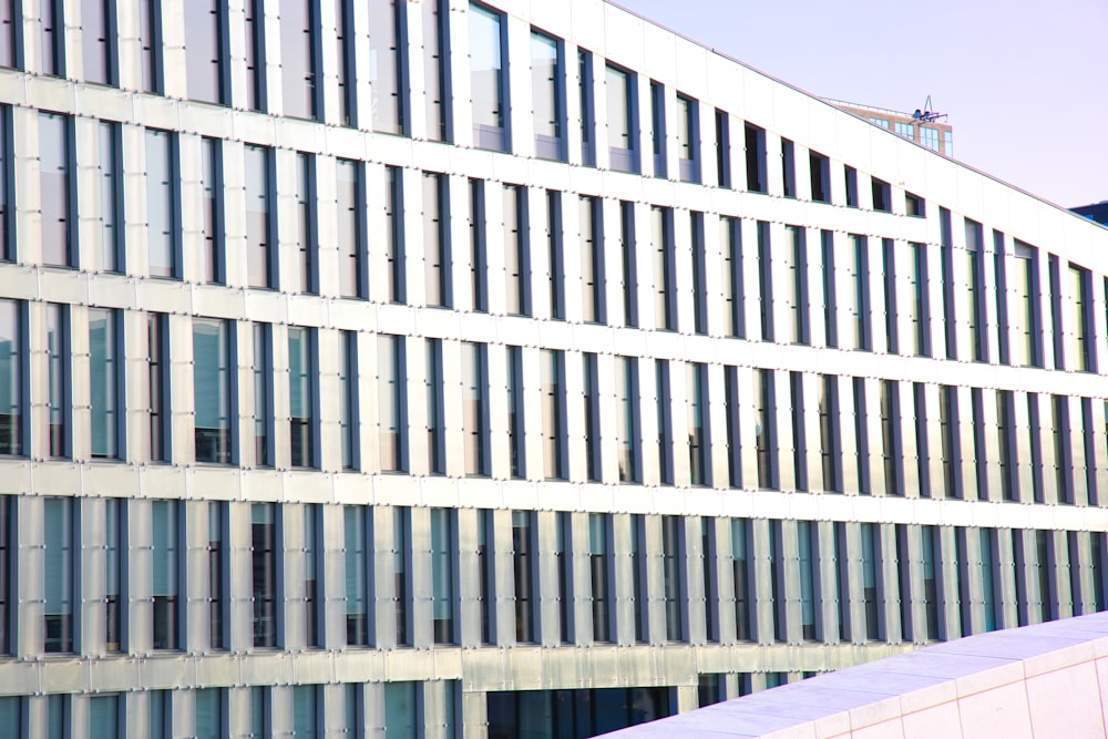 a tall building with a clock on the side of it