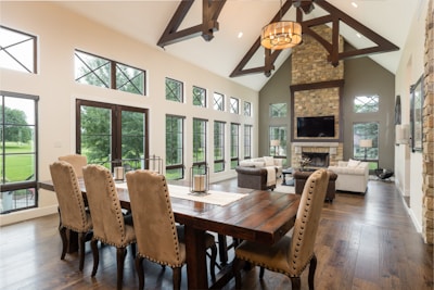 Interior shot showing vaulted ceilings and exposed steel beams in a cozy living area.