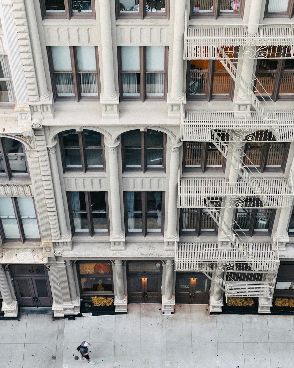 an aerial view of a building with a fire escape