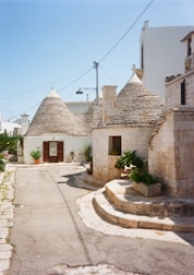 Charming historic street view in Veglie with traditional Salento architecture.