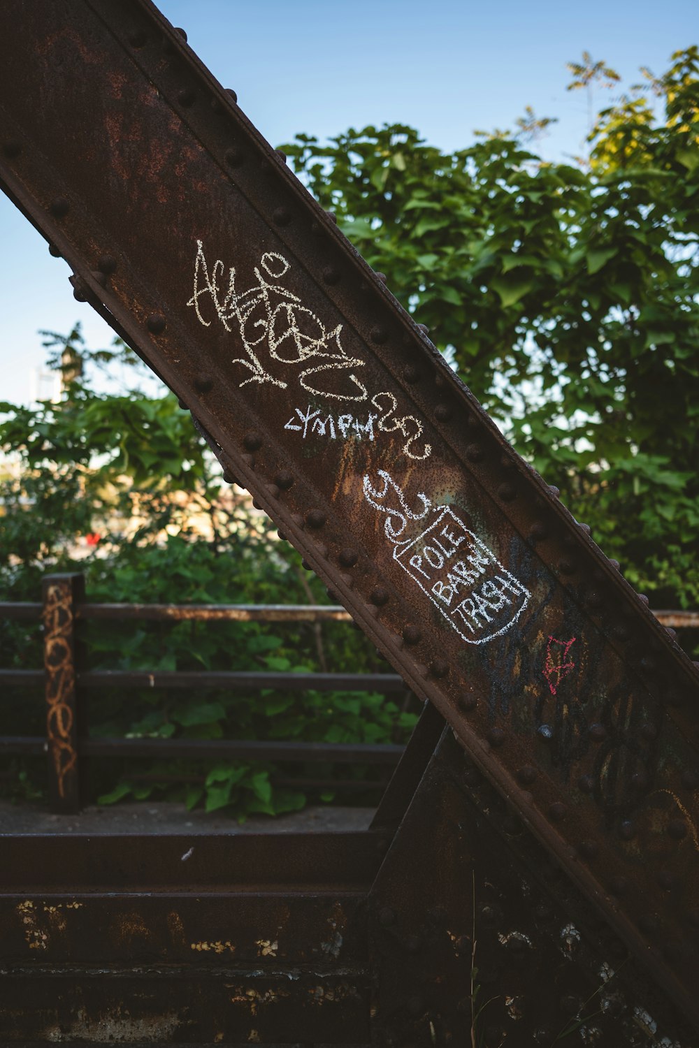 graffiti on the side of a train track