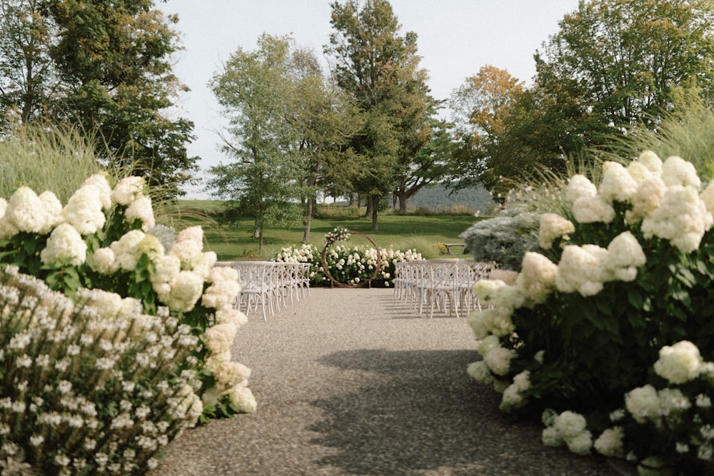 a couple of white chairs sitting next to each other