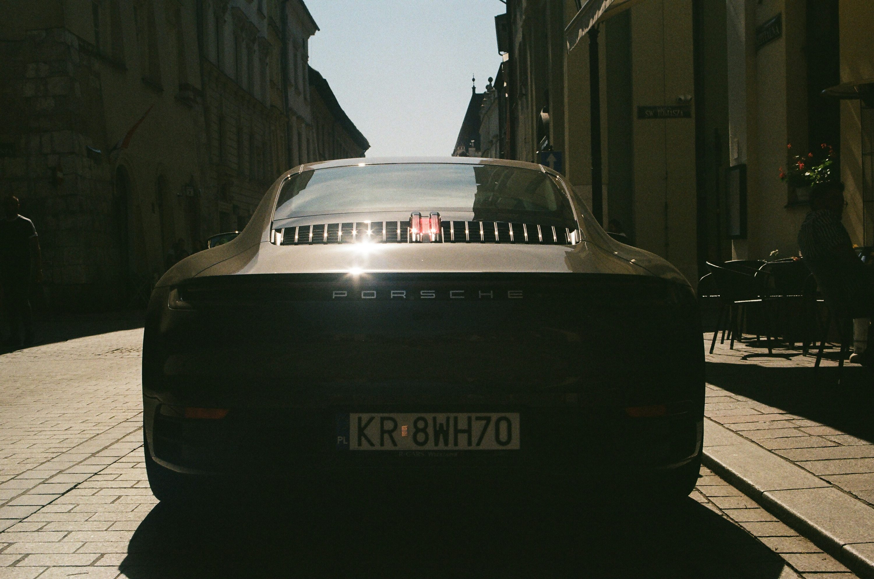 a car parked on the side of a street