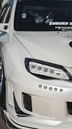 Before and after shots showing a car’s exterior transformation.