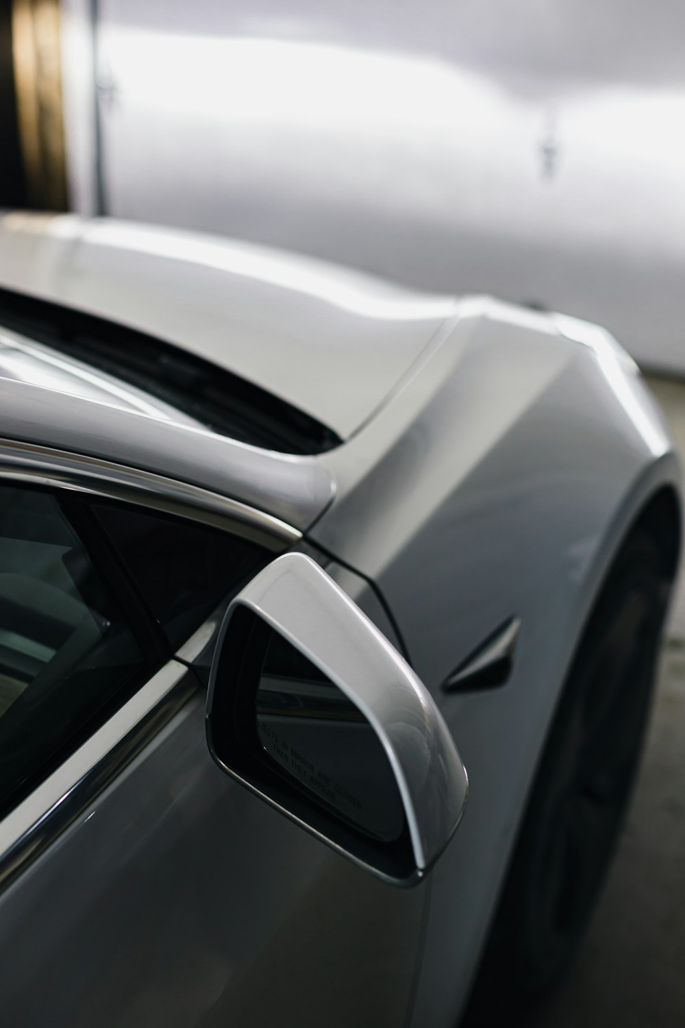 a close up of a car's side view mirror