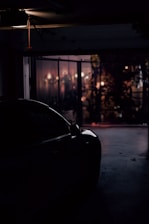 A warm, inviting garage lit by a diesel heater on a chilly evening.