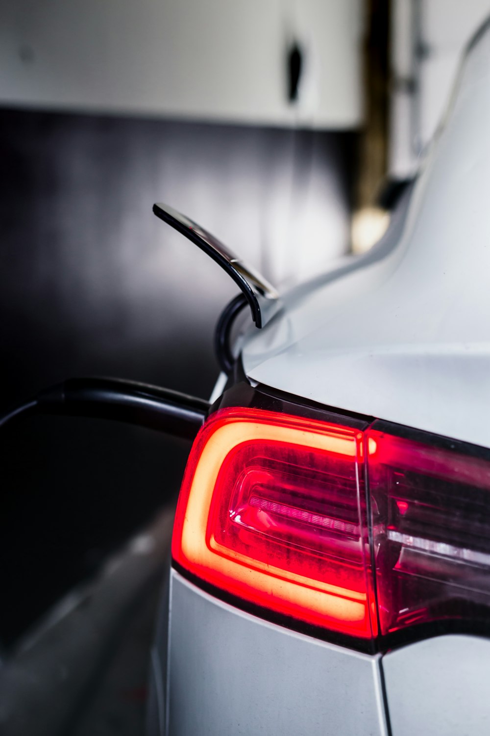 a close up of the tail light of a car