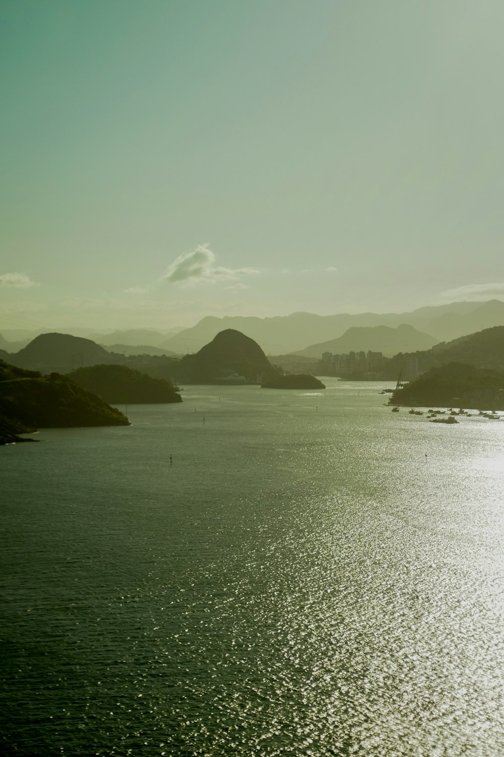 a large body of water surrounded by mountains