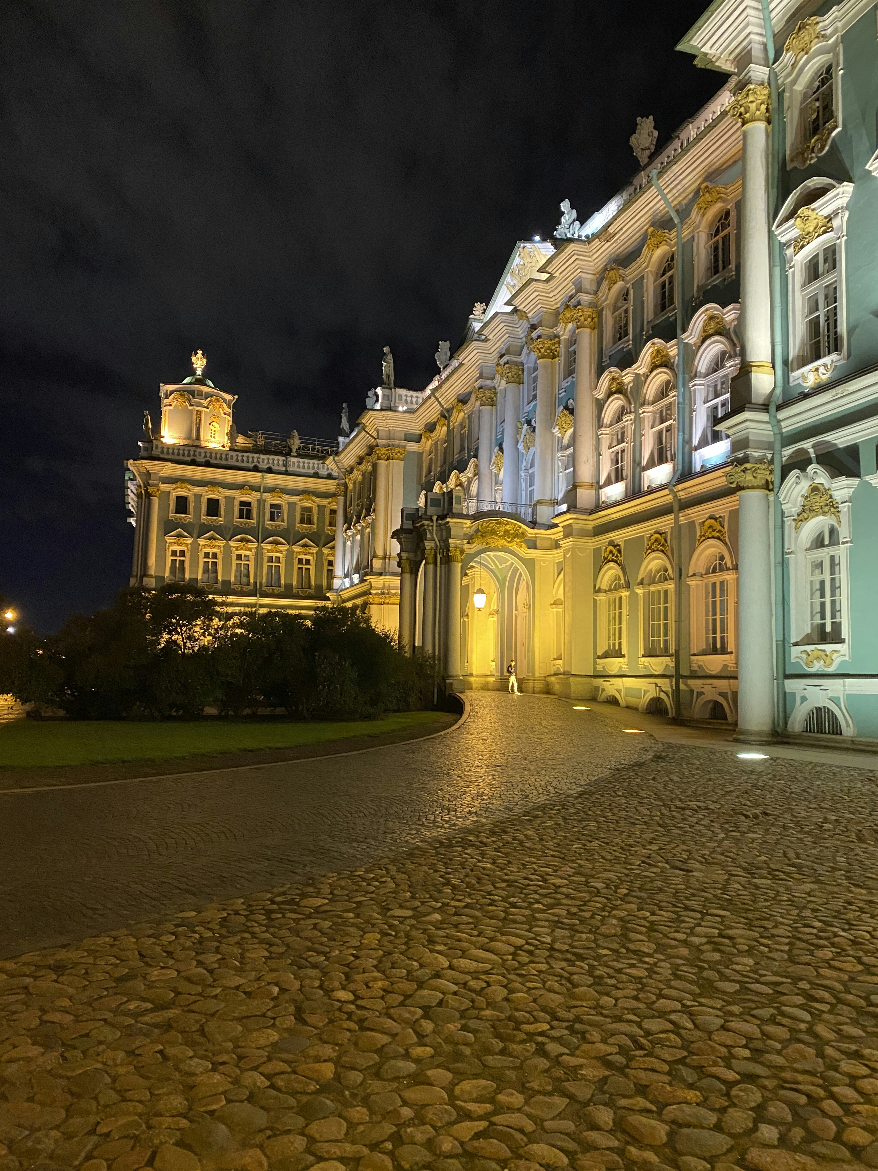 a large building with a clock on the front of it