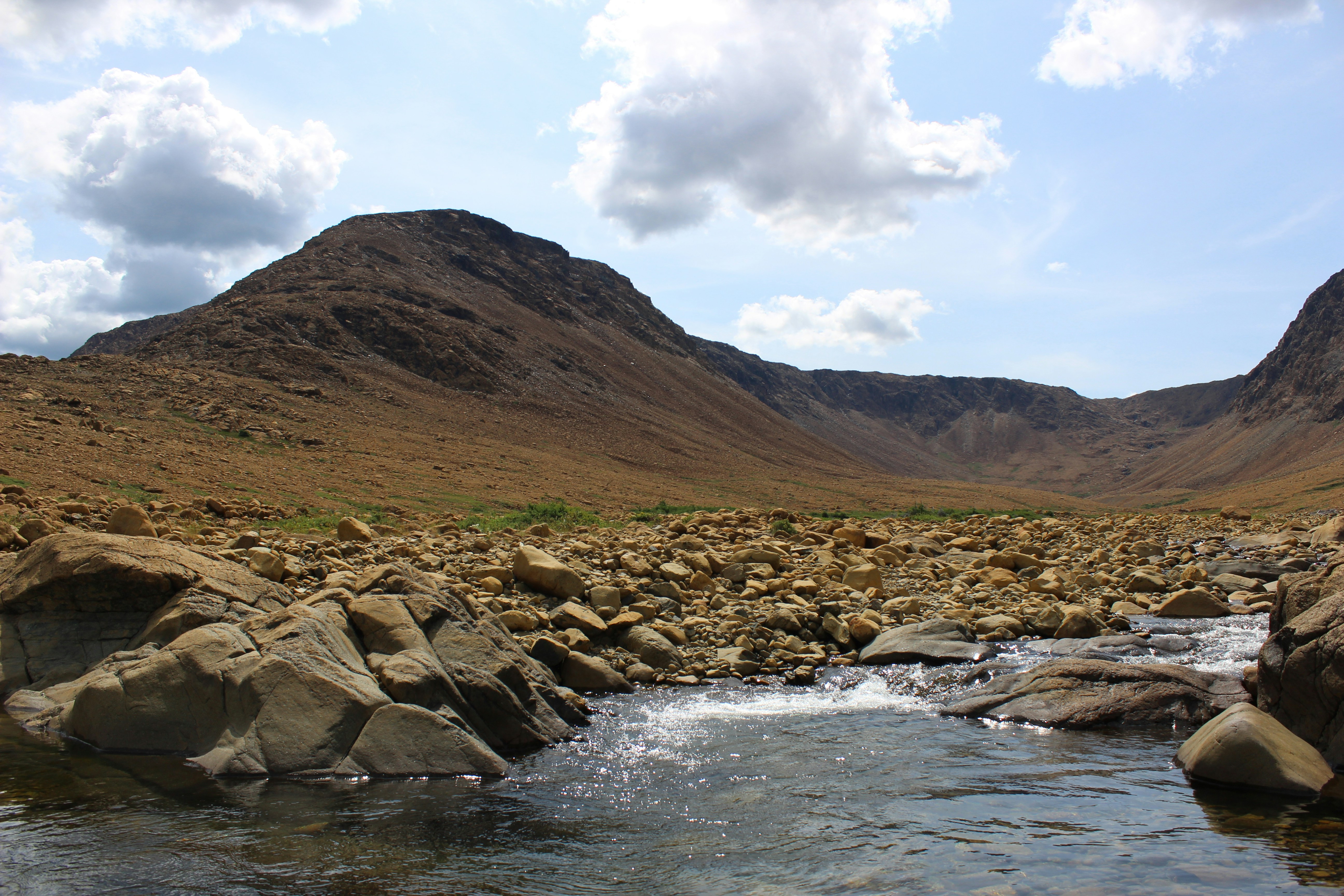Gros Morne National Park, Canada - Looking from the end of the Tableland Trail up towards the hills in Tablelands. Aug 2023.