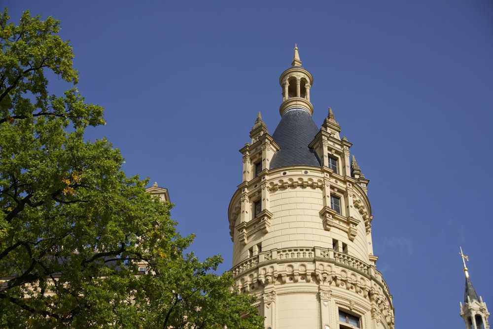 a tall tower with a clock on the top of it