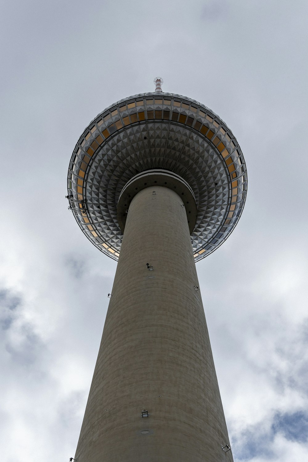 a tall tower with a sky background