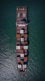 A stunning image of a cargo ship loaded with containers.