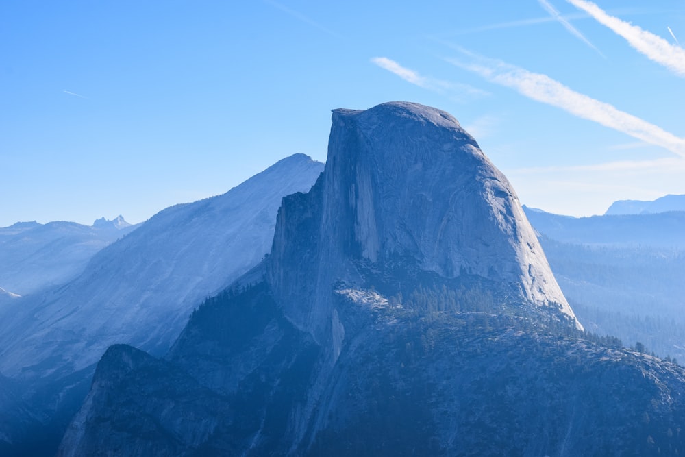 a large mountain with a very tall peak