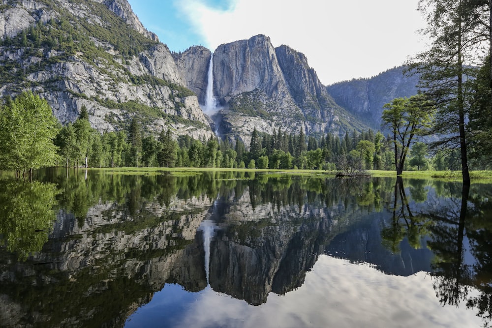 a mountain with a waterfall in the background