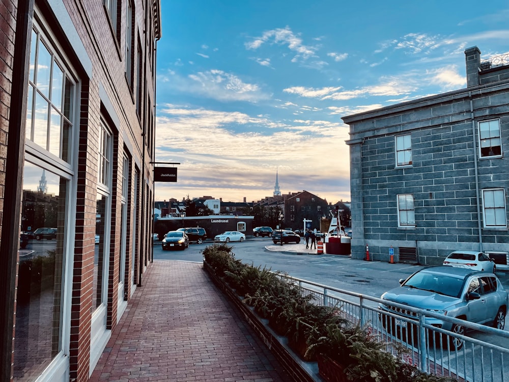 a city street with cars parked on the side of it