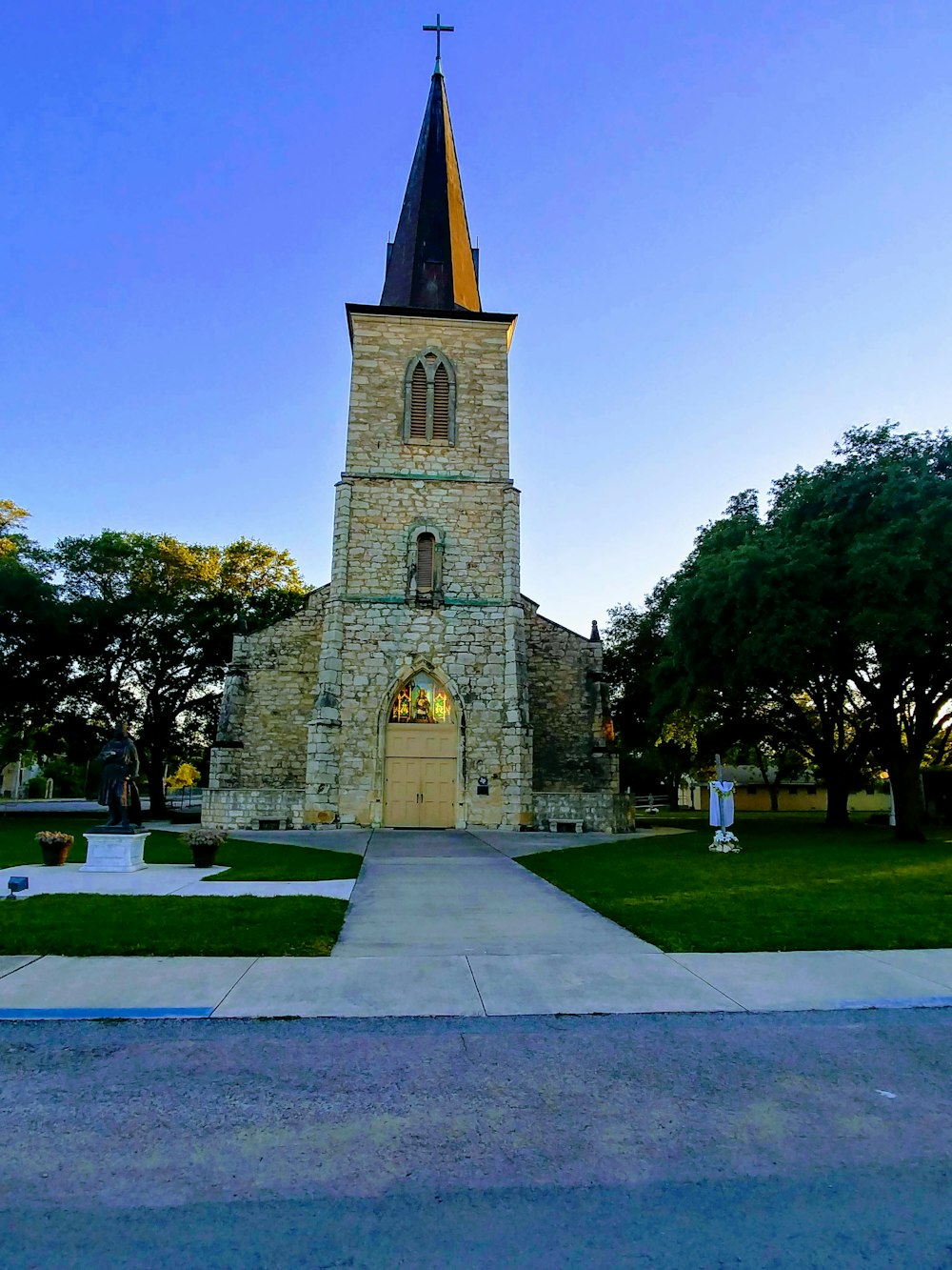 a church with a steeple and a clock tower