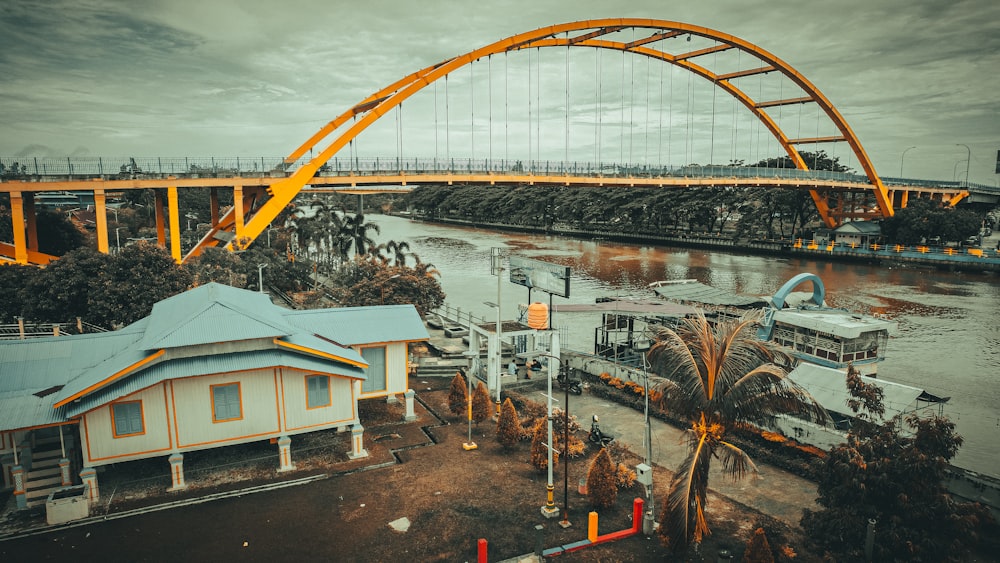 a bridge over a river next to a building