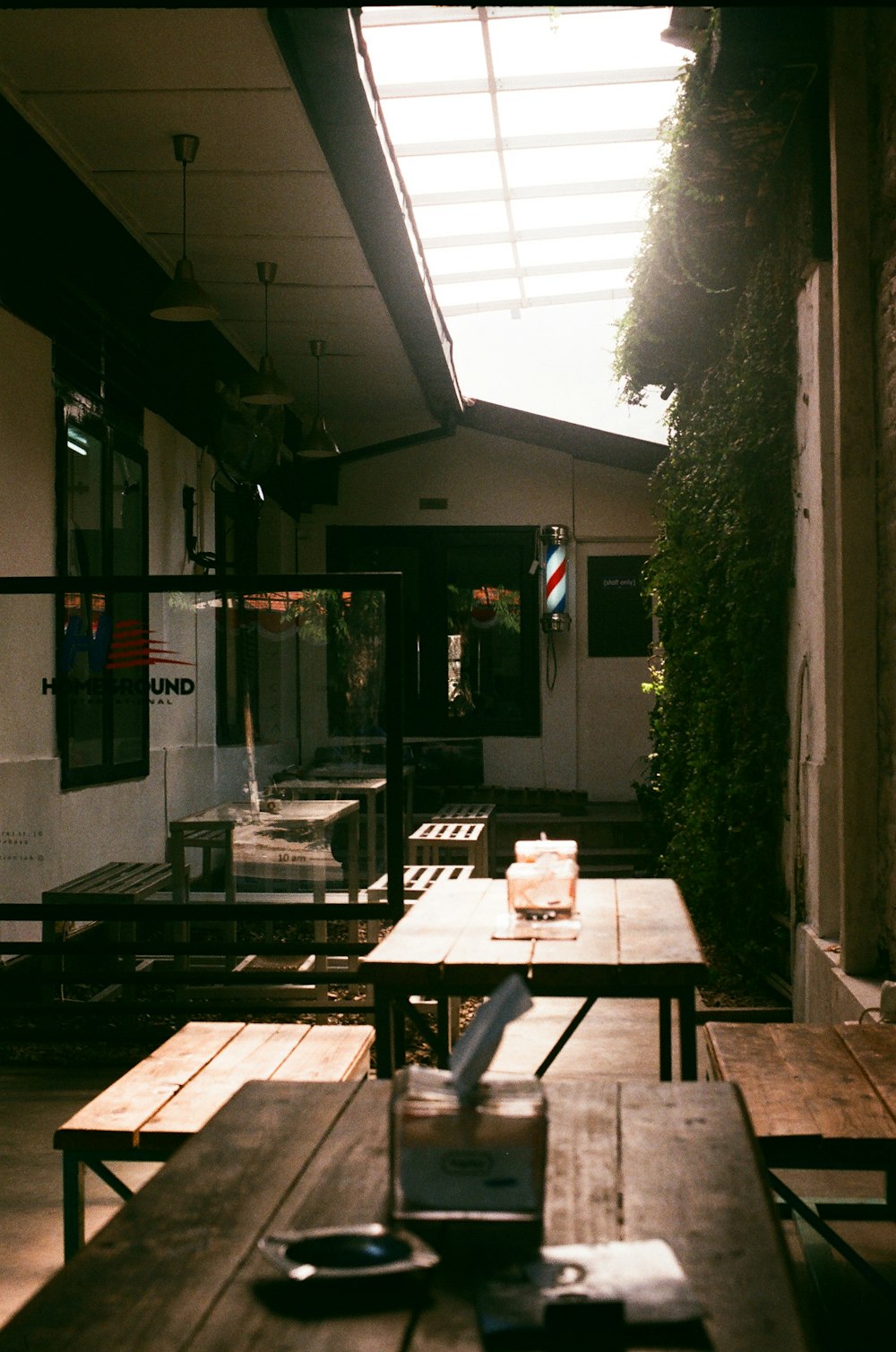 a table with a cake on it in front of a building