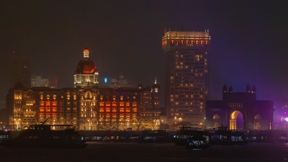 a city skyline at night lit up with lights