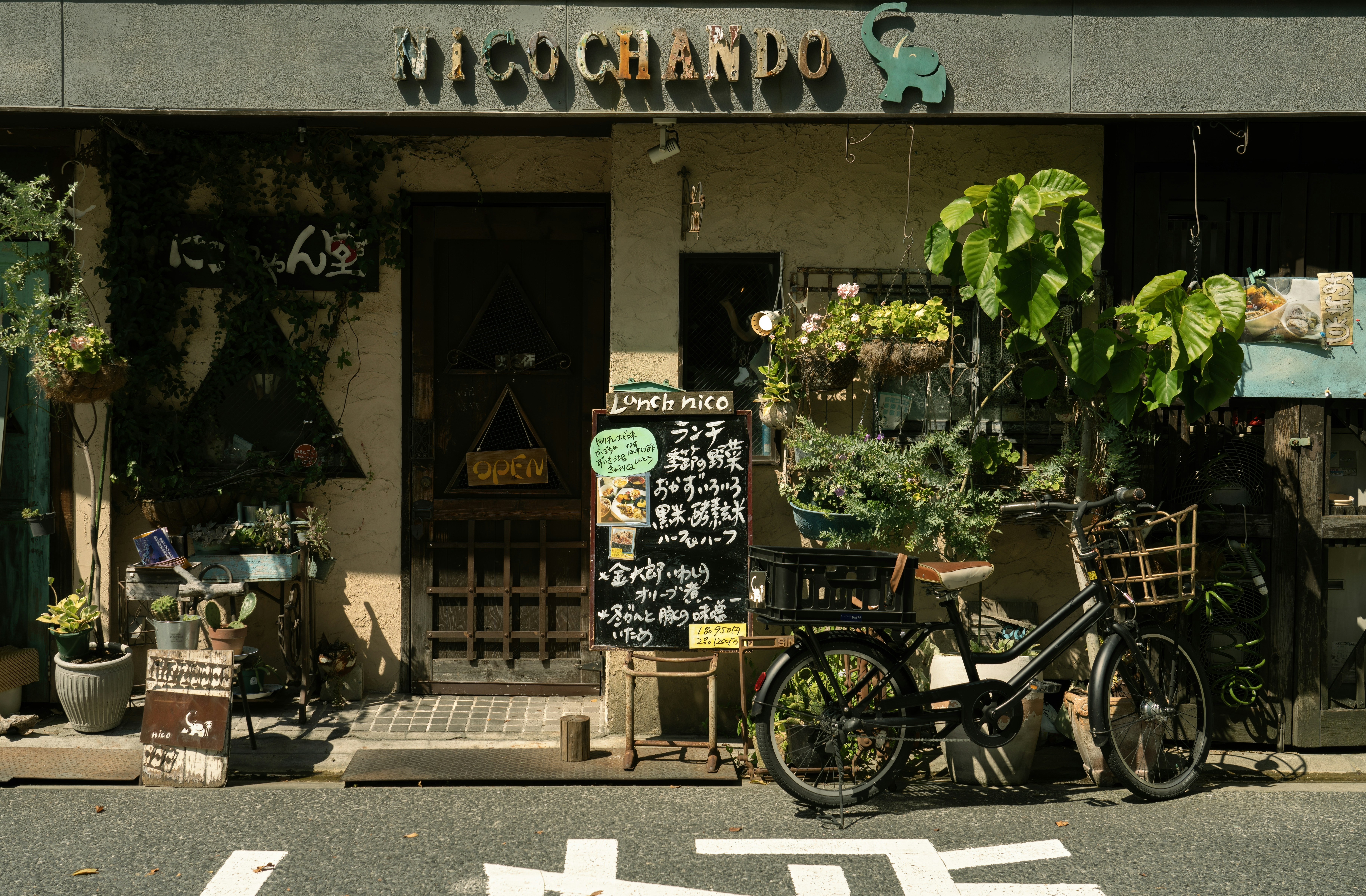 a bicycle is parked outside of a shop