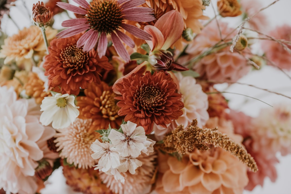 a bunch of flowers that are in a vase