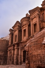 a group of buildings built into the side of a mountain