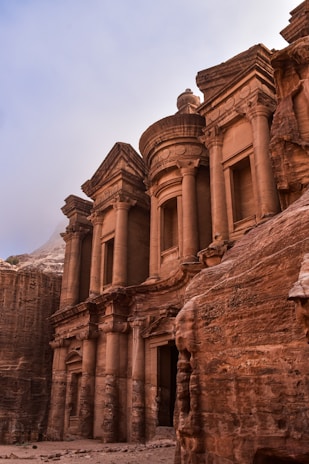 a group of buildings built into the side of a mountain