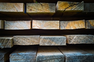 A close-up of high-quality wood planks ready for building.