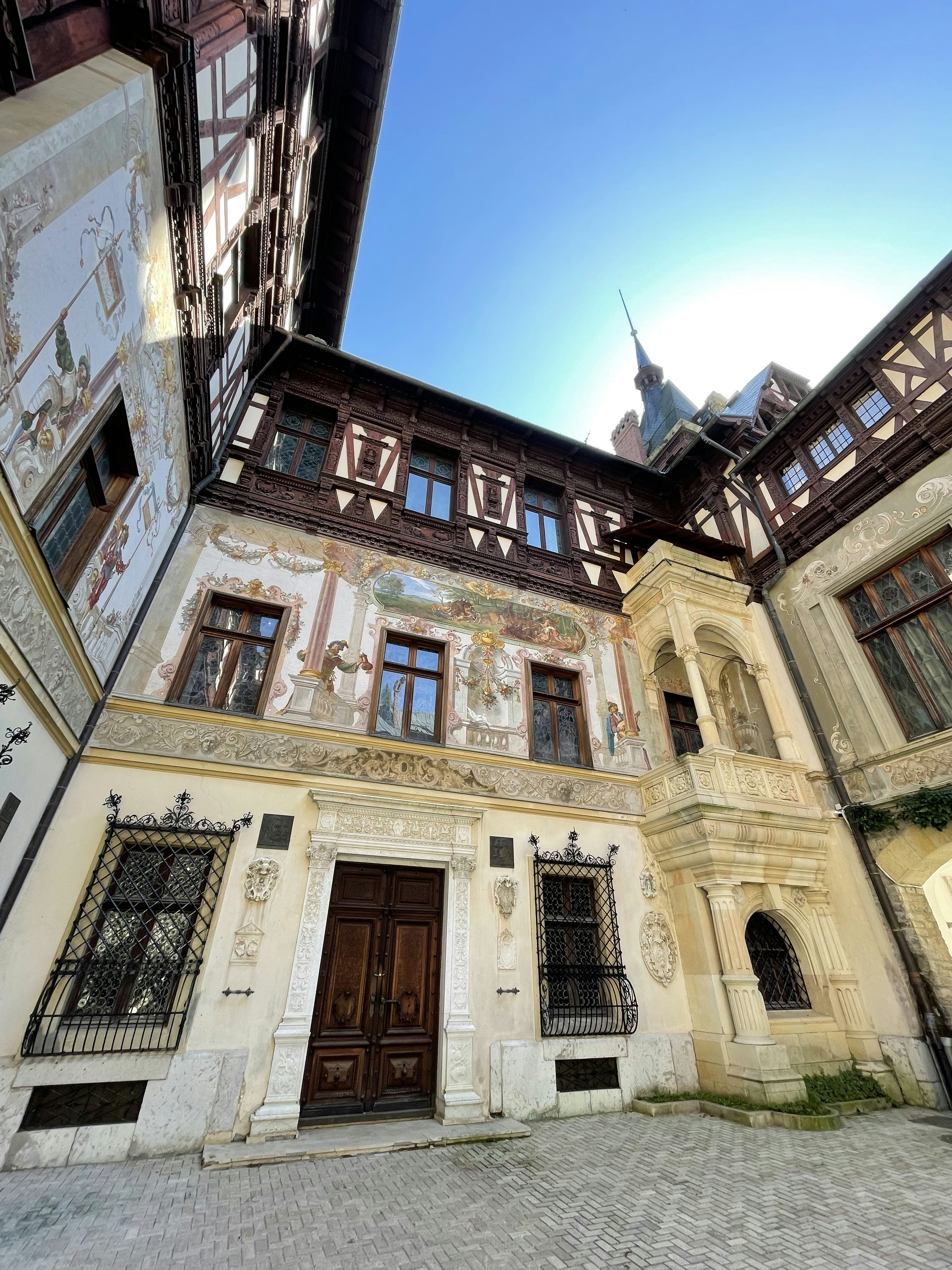 a large building with a lot of windows and doors