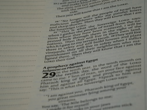 Printed text featuring scripture from a religious book, specifically focusing on prophecies and judgments. The text is organized in paragraphs with certain notable words in bold, and page numbers are visible.