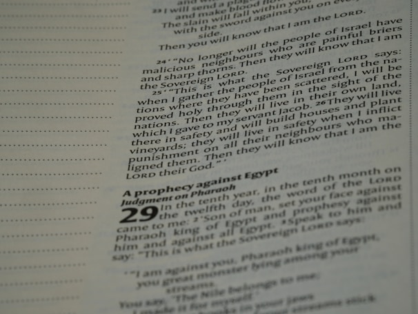 Printed text featuring scripture from a religious book, specifically focusing on prophecies and judgments. The text is organized in paragraphs with certain notable words in bold, and page numbers are visible.