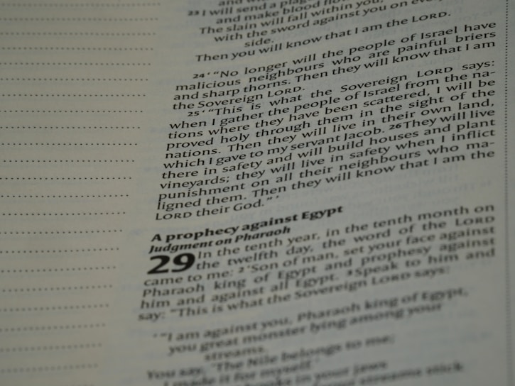 Printed text featuring scripture from a religious book, specifically focusing on prophecies and judgments. The text is organized in paragraphs with certain notable words in bold, and page numbers are visible.
