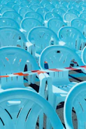Crowd control barriers arranged neatly around an outdoor event, with safety yellow accents visible.