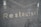 Metallic letters spelling 'Restaurant' are embedded against a textured, dark gray surface. The surface features horizontal grooves giving it a modern, industrial look.