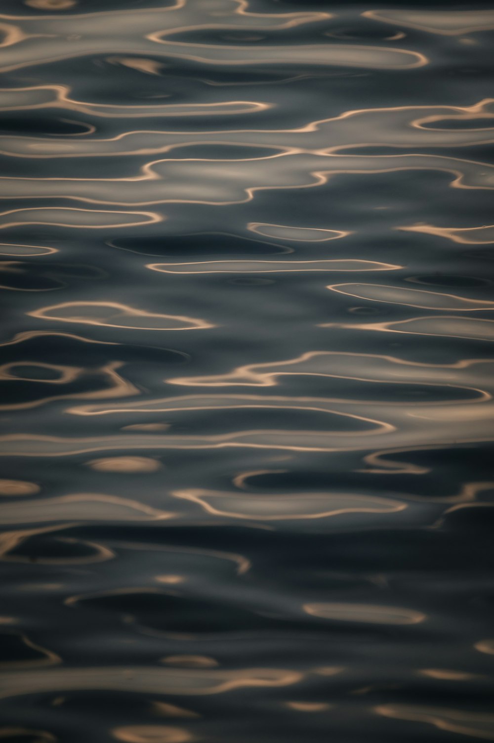 a large body of water with waves on it