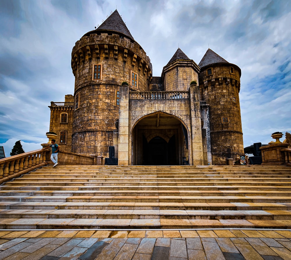 a castle like building with steps leading up to it