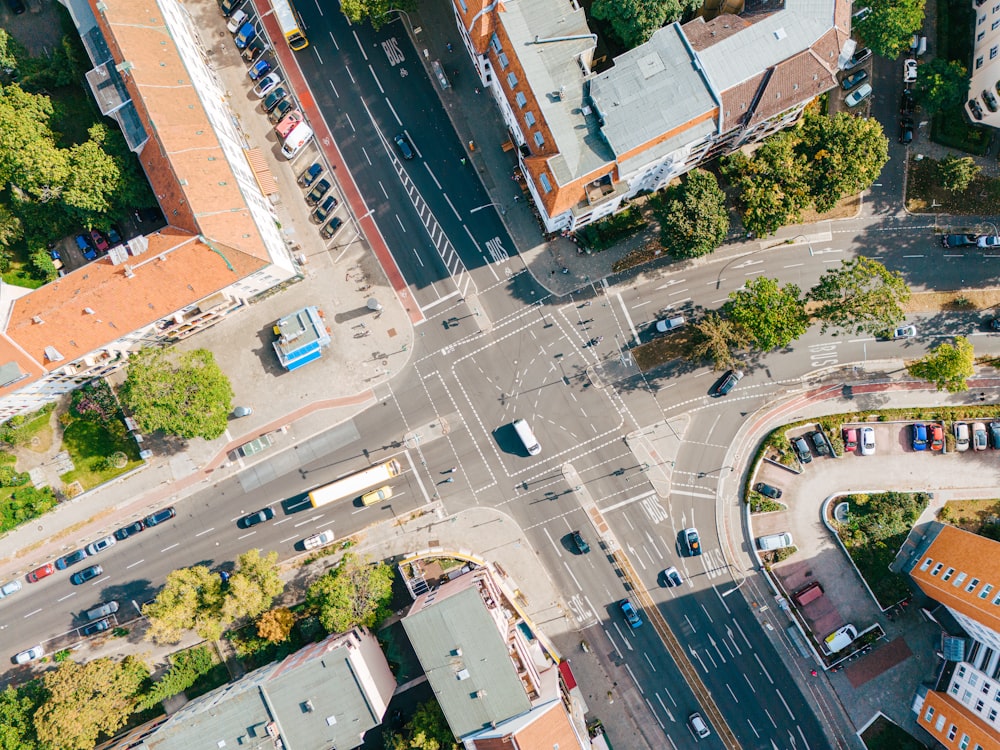 an aerial view of a street intersection in a city