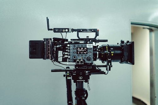 a video camera sitting on top of a tripod